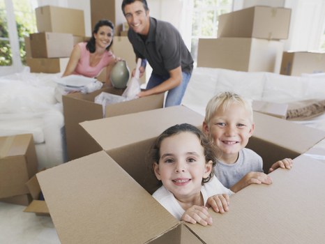 Removal team pricing a move in a Hackney flat