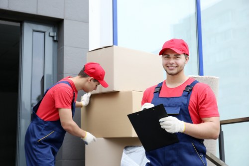 Removal team preparing equipment and assessing safety before a move