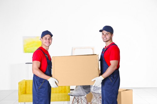 Office removals planning in Hackney with moving boxes and workspace preparation
