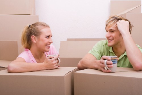 Professional flat removals team working in a Hackney apartment building