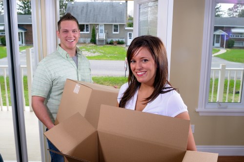 House removalists in Hackney packing and loading boxes for a local home move