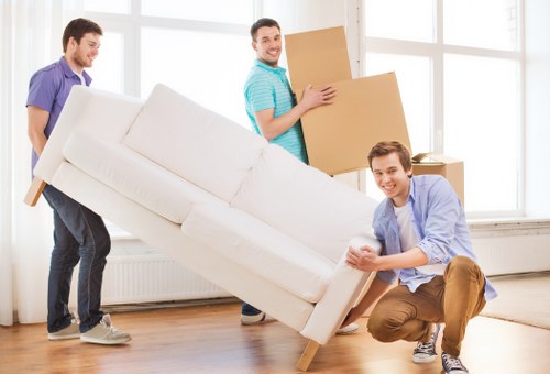 Loading furniture into a van for a Hackney relocation