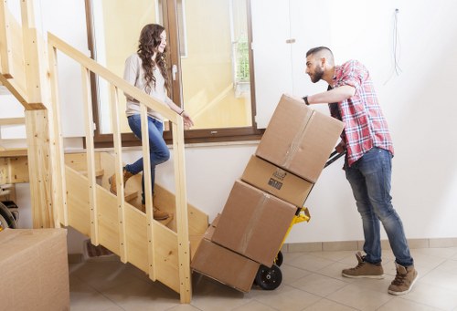 Packing and labeling office equipment for a Hackney business move