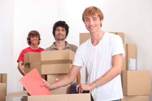 Careful packing of fragile household items by house removalists in Hackney