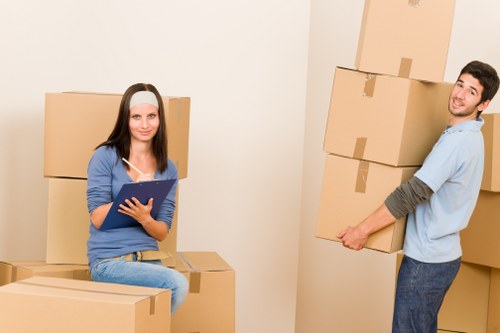 Boxes stacked neatly in a new Hackney home after moving